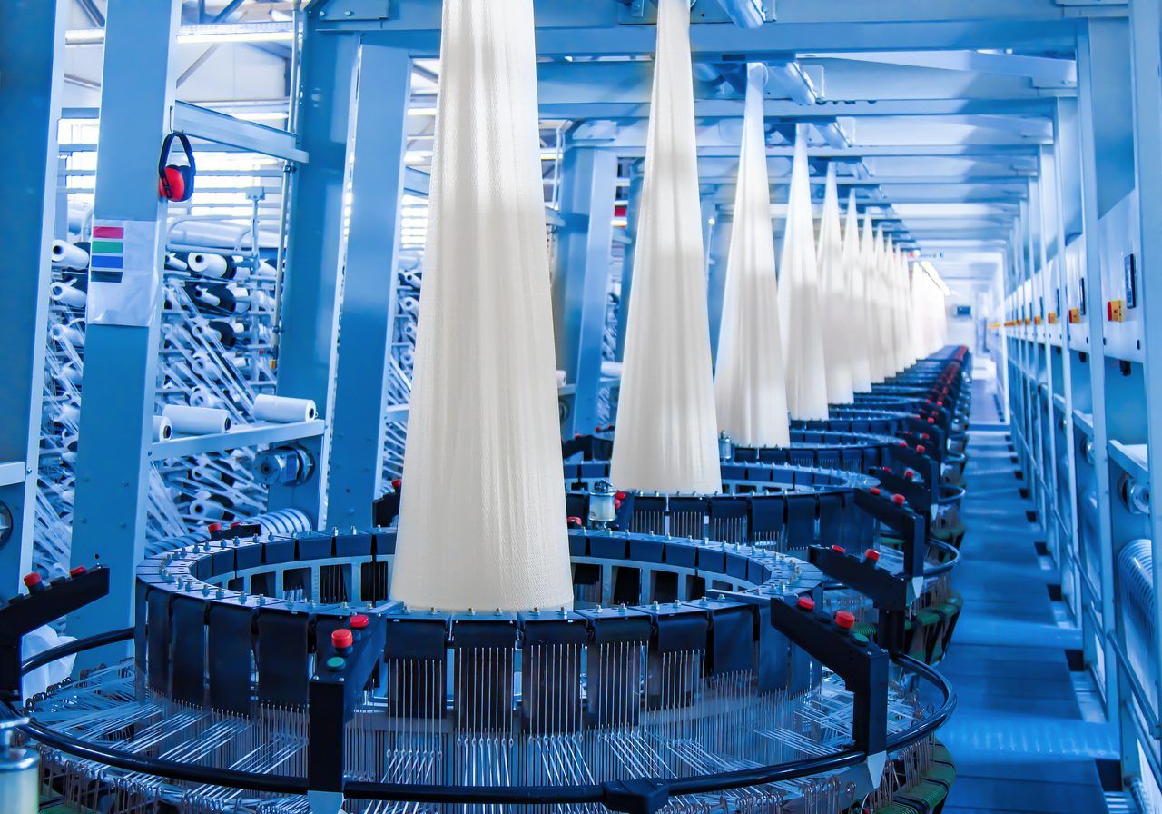 Circular looms weaving polypropylene yarn for industrial bags
